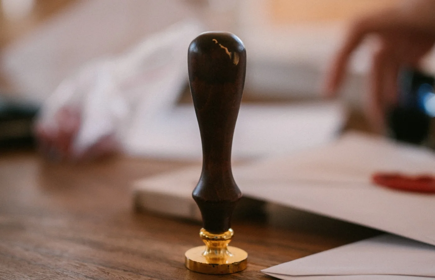Wooden wax seal stamp on a table